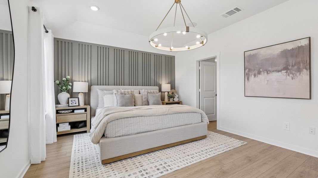 Furnished interior in a model home at Monarch Ranch in Manor (Image 28).