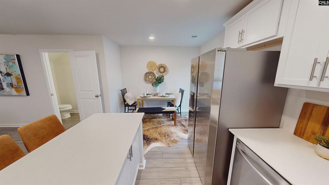 Furnished interior in a model home at Village at Boulware in Lugoff (Image 38).