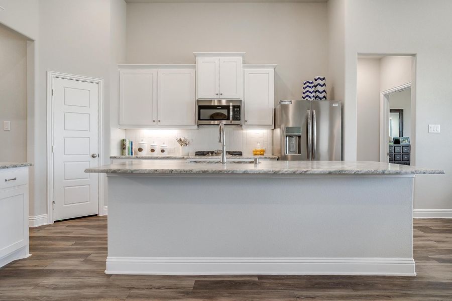 Furnished interior in a model home at Creekview Farms in Greenville (Image 18).