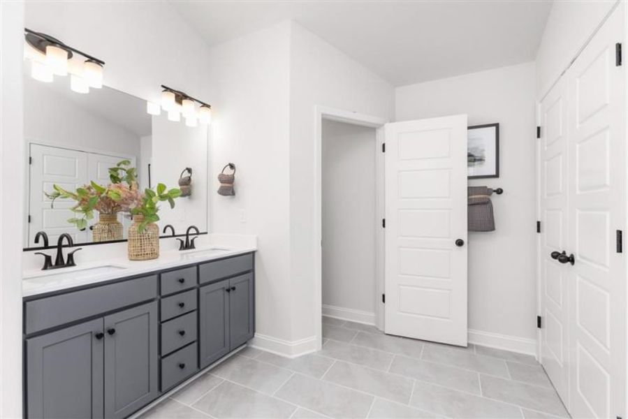 Furnished interior in a model home at Miller's Reserve in Greensboro (Image 33).