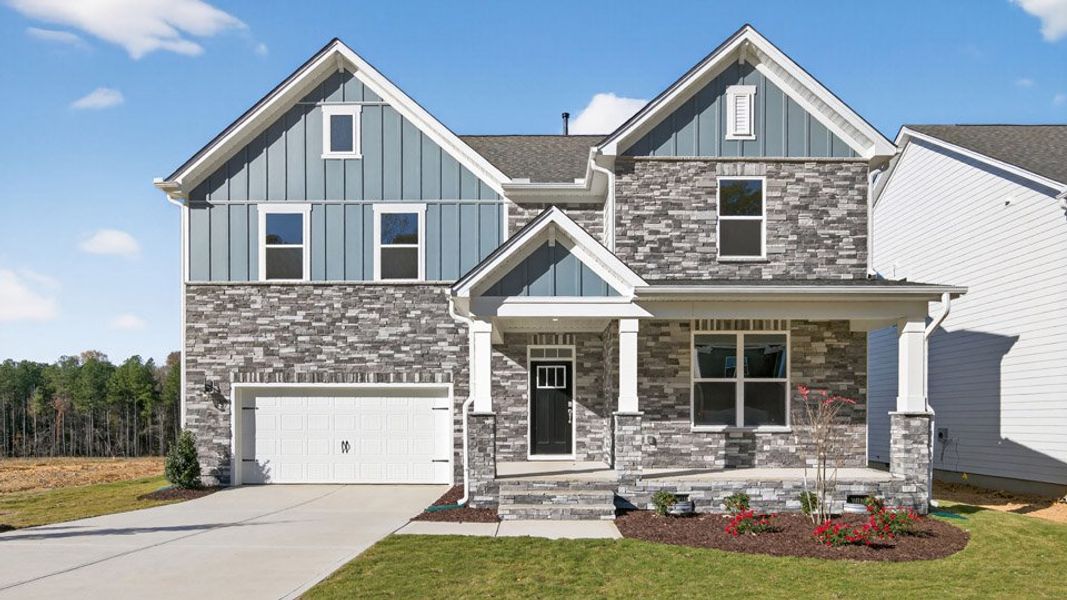 Front exterior of a home in the The Estates Park community, located in Apex, NC (Image 2). Front exterior of a home in the The Estates Park community, located in Apex, NC (Image 2).