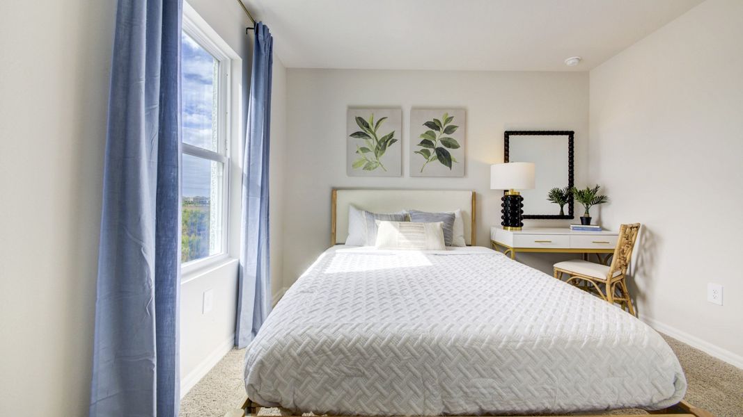 Furnished interior in a model home at The Gardens at Bay Street in Sarasota (Image 25).