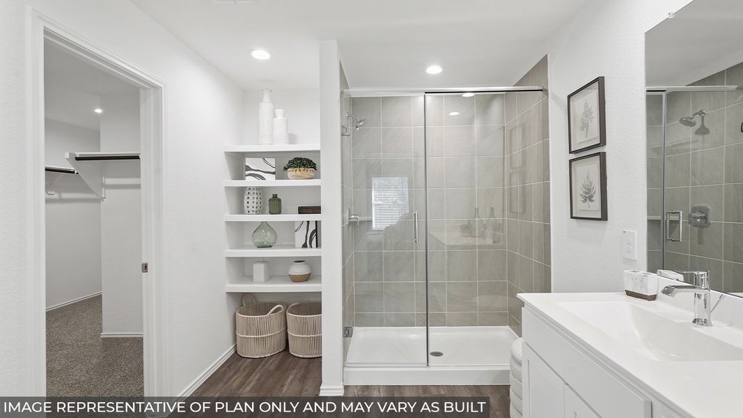 Furnished interior in a model home at East Williams Cove in Conroe (Image 16). Furnished interior in a model home at East Williams Cove in Conroe (Image 16).