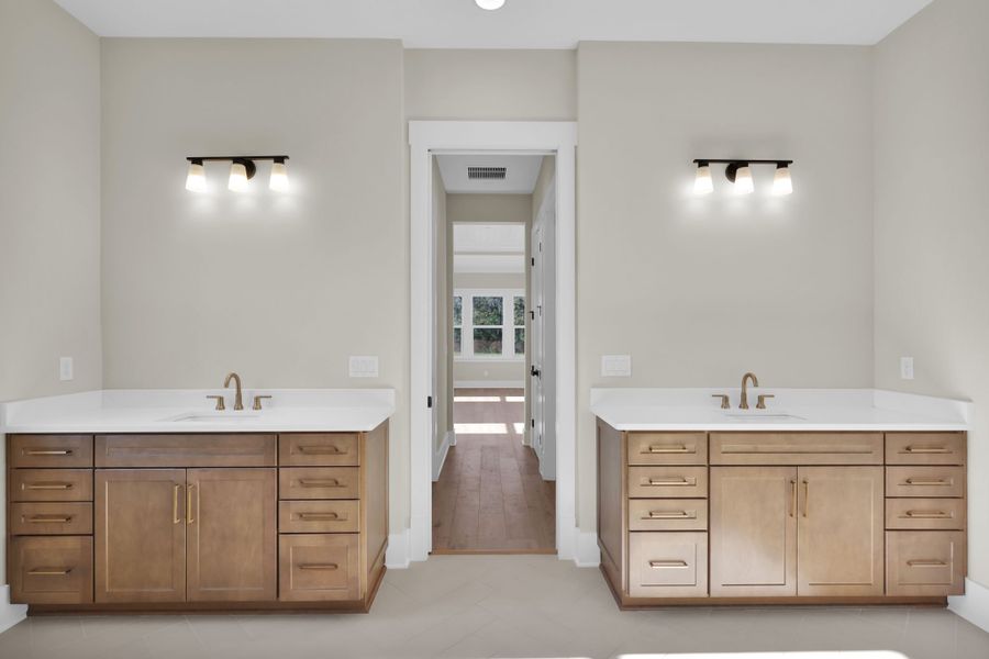 Furnished interior in a model home at Hidden Creek at SilverLeaf in St. Augustine (Image 30).