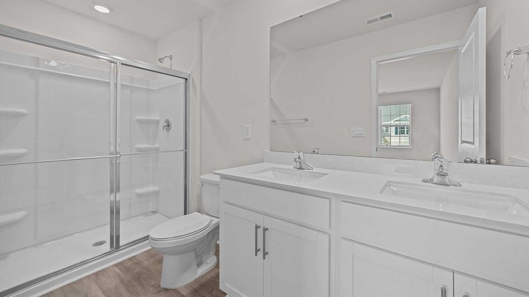 Furnished interior in a model home at The Townes at Carter Ridge in Greenville (Image 4).