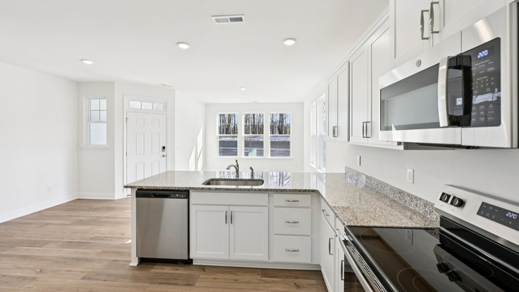 Furnished interior in a model home at Mason Grove in Franklinton (Image 9).