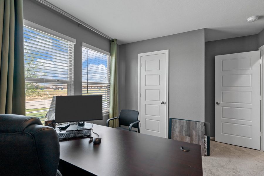 Furnished interior in a model home at Faculty Row in Abilene (Image 28).