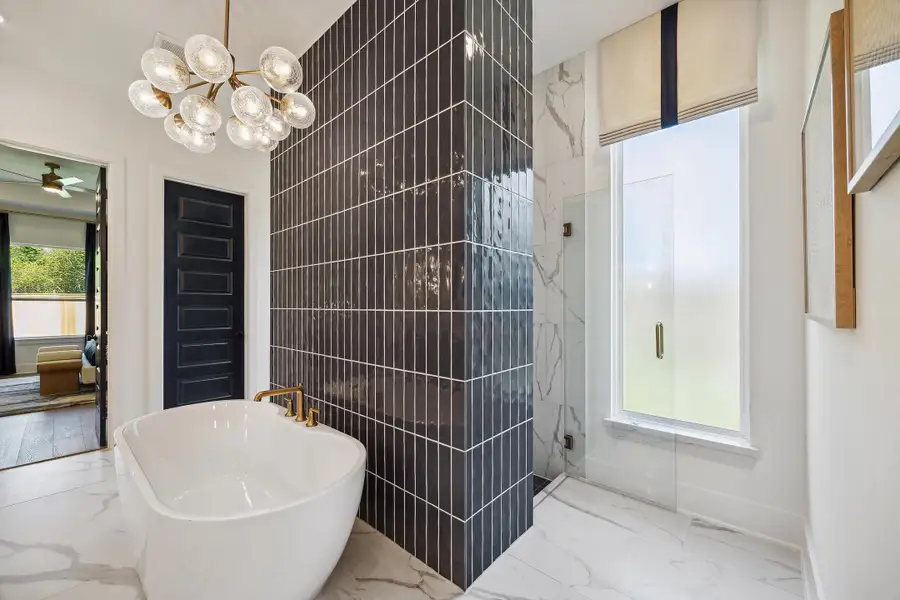 Furnished interior in a model home at Audubon - 70' in Magnolia (Image 18).