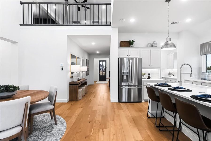 Furnished interior in a model home at The Reserve at Spiritas Ranch in Little Elm (Image 6).