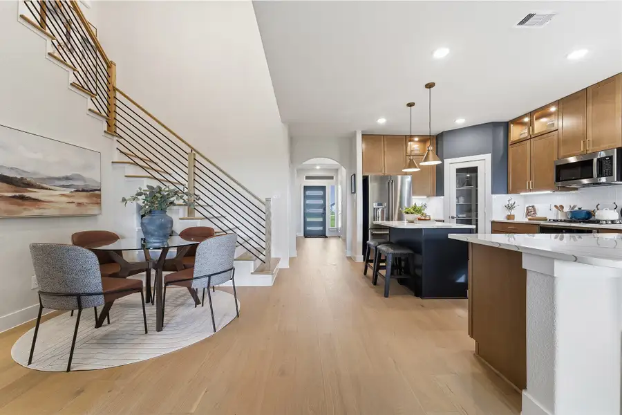 Furnished interior in a model home at Wildrye in Waller (Image 36).