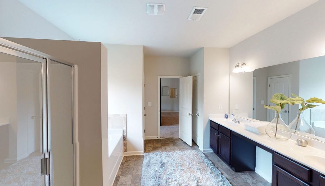 Furnished interior in a model home at North Village in Rydal (Image 18).