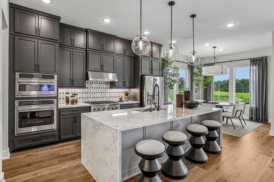 Furnished interior in a model home at Manors Collection - Freedom at Anthem in Kyle (Image 4).