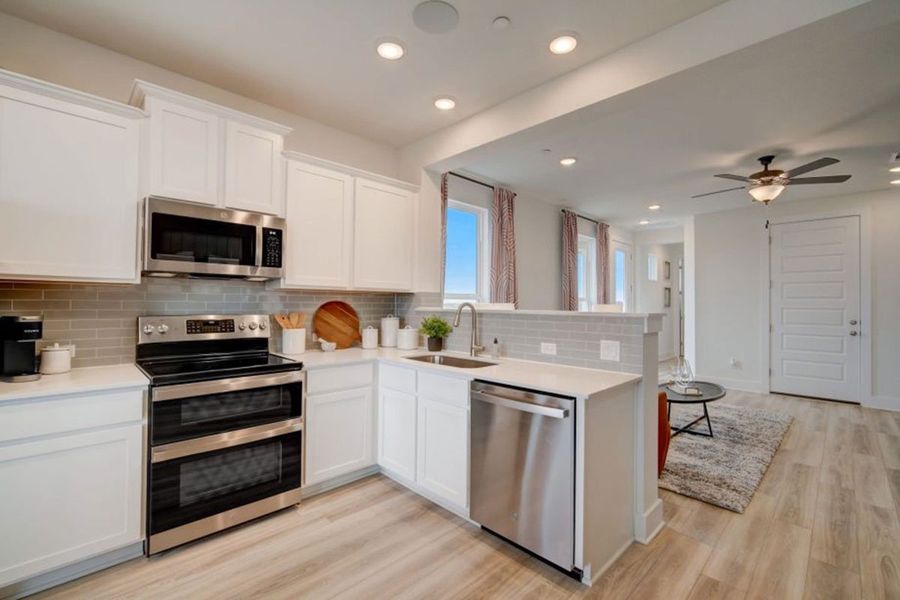 Furnished interior in a model home at Avery Centre in Round Rock (Image 35).