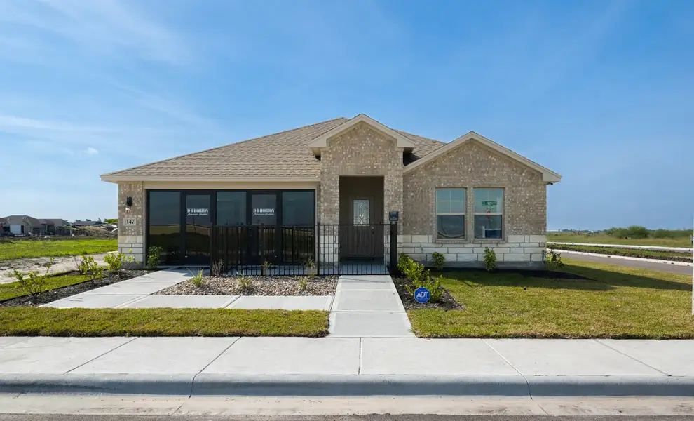 Front exterior of a home in the Somerset at Sinton community, located in Sinton, TX (Image 1).