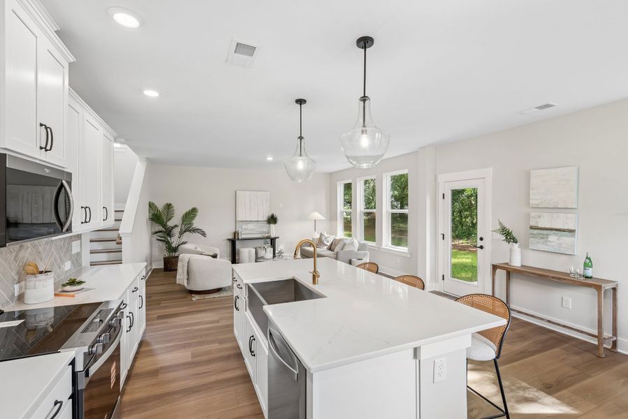 Furnished interior in a model home at Discover Series - Select in Mount Pleasant (Image 5).