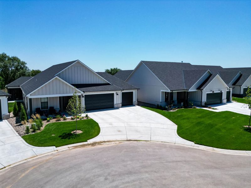 Front exterior of a home in the The Courtyards at Jacobs Farm community, located in Wichita, KS (Image 24). Front exterior of a home in the The Courtyards at Jacobs Farm community, located in Wichita, KS (Image 24).