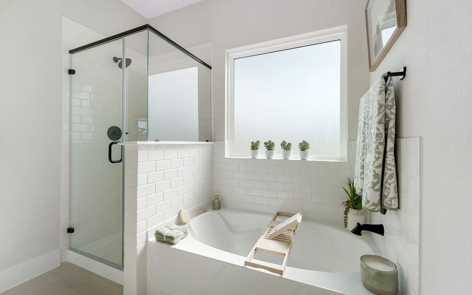 Furnished interior in a model home at Grande Estates in Bertram (Image 30).