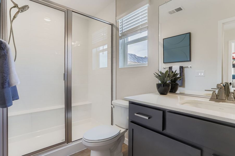 Furnished interior in a model home at Barefoot in Firestone (Image 3).