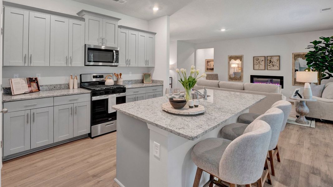 Furnished interior in a model home at Riverwood Gardens in Oakland (Image 23).