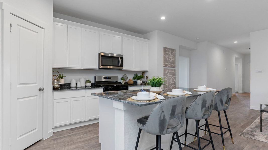 Furnished interior in a model home at August Trails in Needville (Image 16).