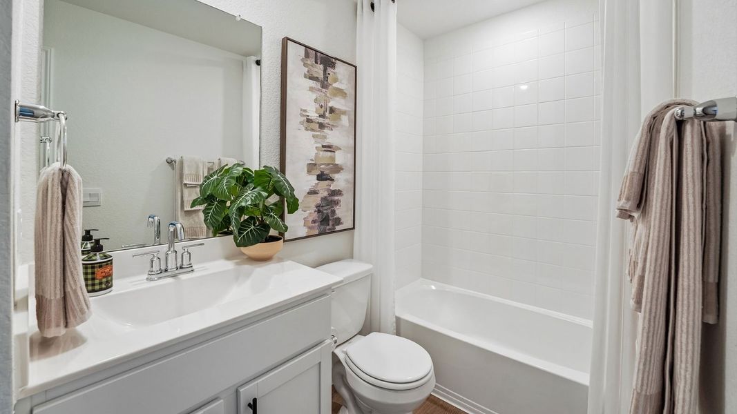 Furnished interior in a model home at Palomino in Manor (Image 29).