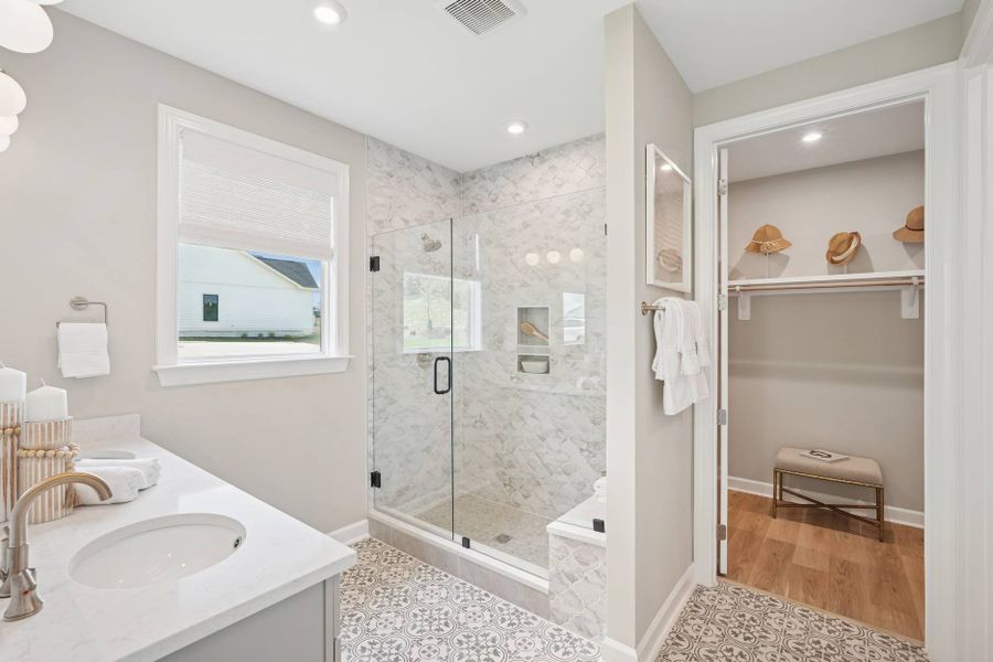 Furnished interior in a model home at The Grove Collection at Serenity in Fuquay Varina (Image 15). Furnished interior in a model home at The Grove Collection at Serenity in Fuquay Varina (Image 15).