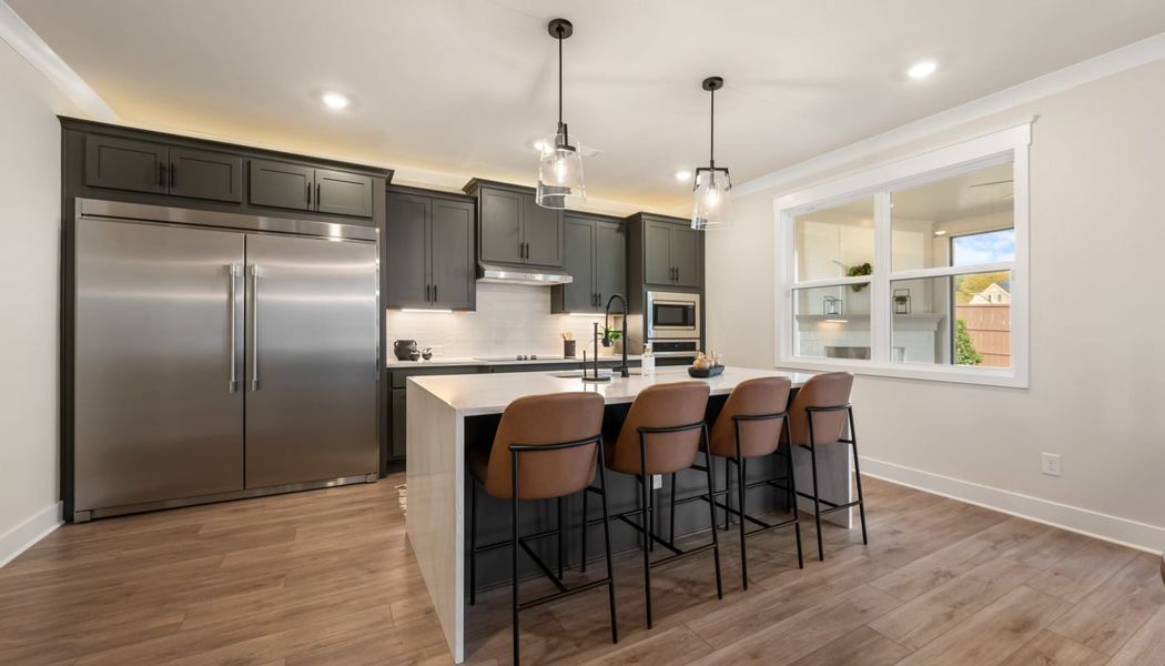 Furnished interior in a model home at Pinecrest Ridge in Dacula (Image 20).