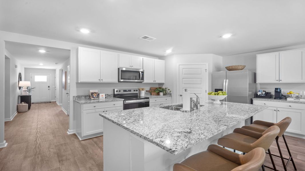 Furnished interior in a model home at Holly Oaks in Statesboro (Image 19).