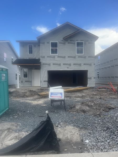 Under-construction home with spacious entry in Lindera Preserve at Cane Bay Plantation: Townhomes by Lennar (Summerville, SC).