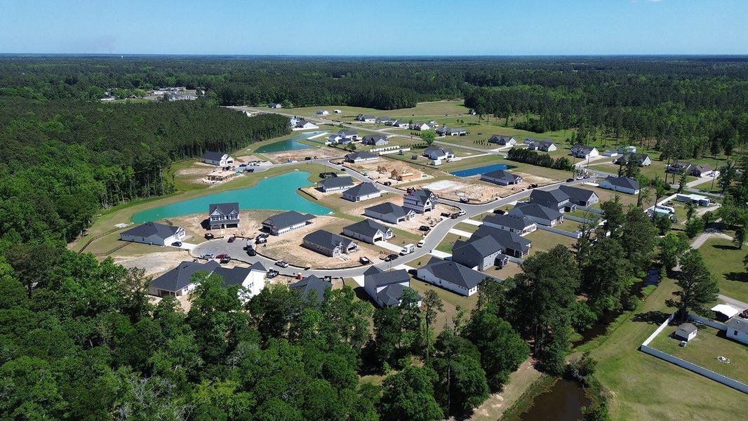 Aerial view of the Coastal Farms community in Conway, SC, showing layout and nearby surroundings (Image 12). Aerial view of the Coastal Farms community in Conway, SC, showing layout and nearby surroundings (Image 12).