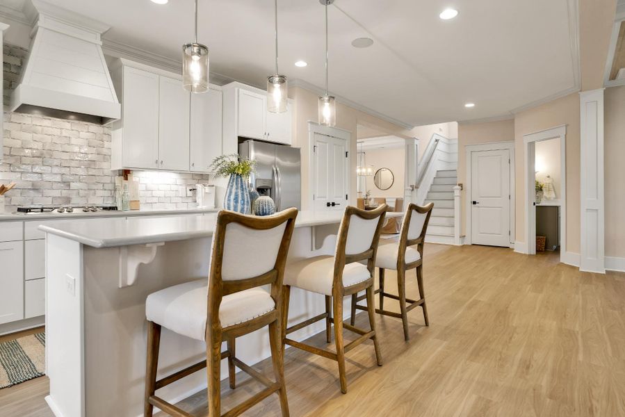 Furnished interior in a model home at Carolina Creek in Hampstead (Image 14).