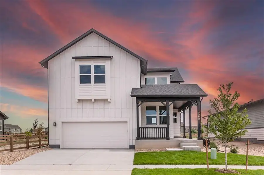 Front exterior of a home in the Prairie Song Story Collection - Single Family Homes community, located in Windsor, CO (Image 2). Front exterior of a home in the Prairie Song Story Collection - Single Family Homes community, located in Windsor, CO (Image 2).