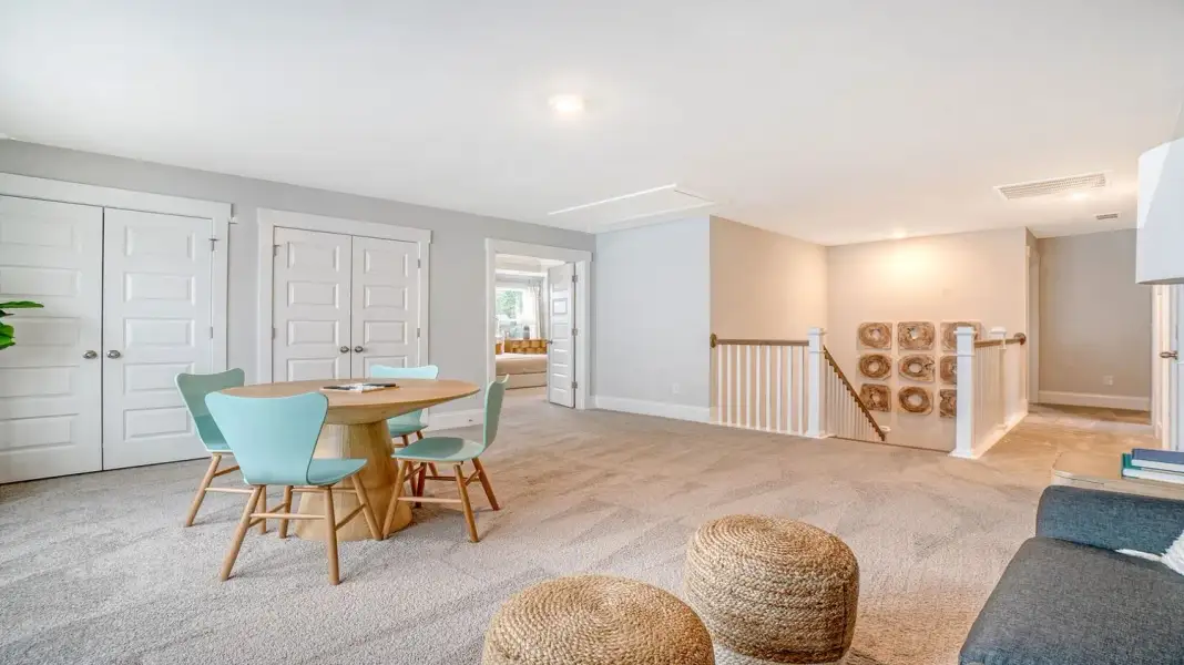 Furnished interior in a model home at Wappetaw Woods in Awendaw (Image 14).