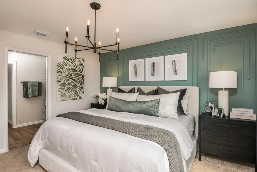 Furnished interior in a model home at Grove at Crosswinds in Haines City (Image 7).