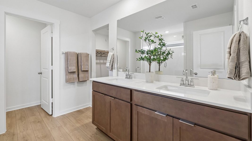 Furnished interior in a model home at Monarch Ranch in Manor (Image 31).