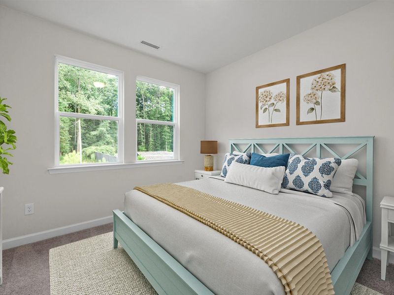 Furnished interior in a model home at Windgate in Mooresville (Image 9).