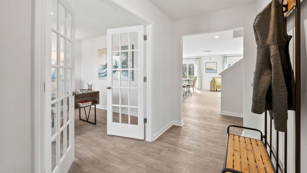 Furnished interior in a model home at Paddock Point in Roebuck (Image 4).