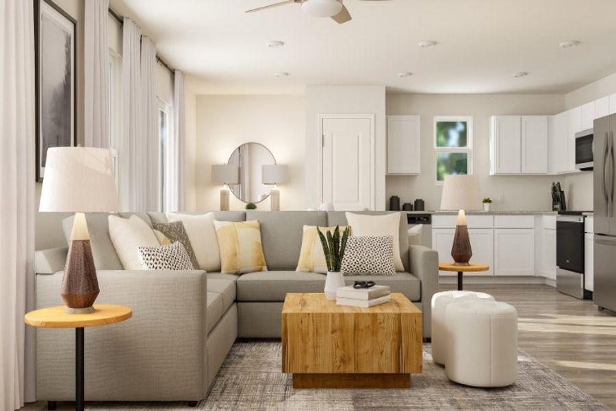 A living room with a couch and a coffee table. A living room with a couch and a coffee table.