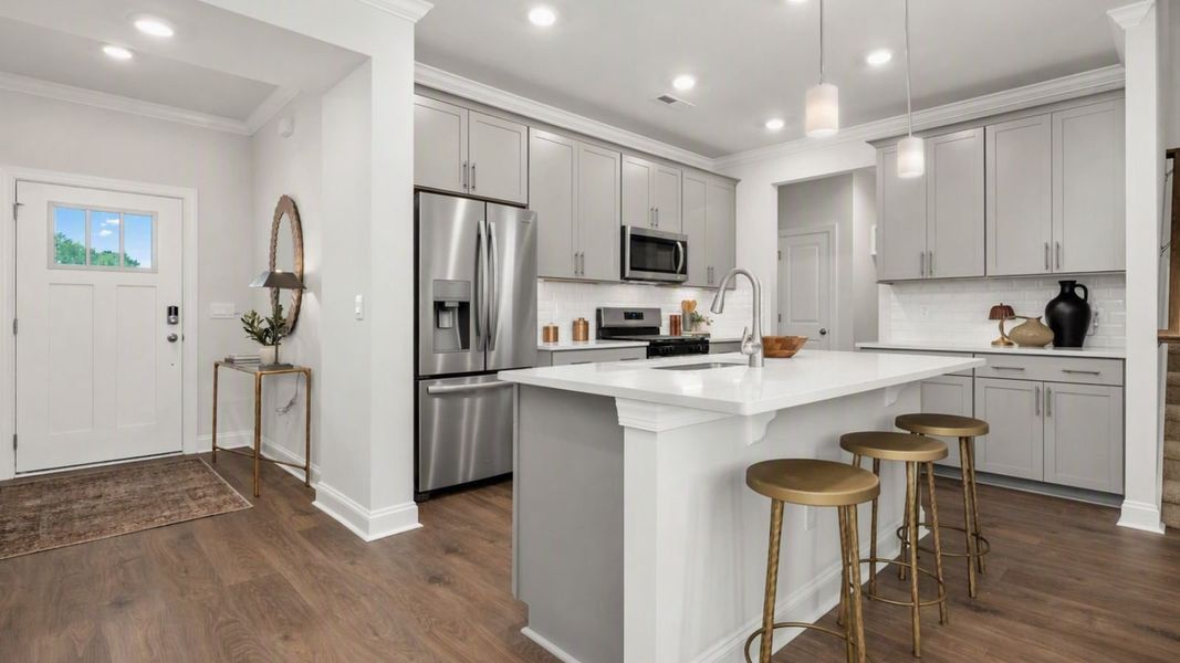 Furnished interior in a model home at The Meadows at Kinsley in Jamestown (Image 5).