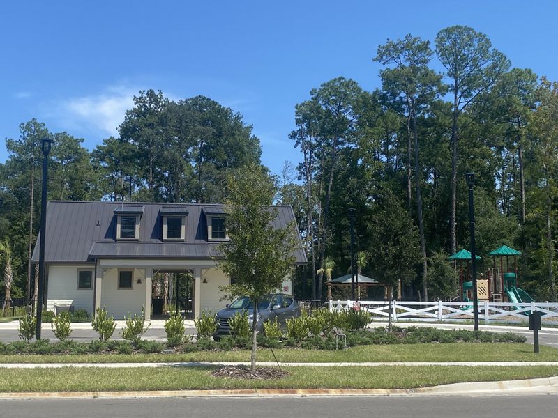 A charming clubhouse and playground nestled in Jennings Farm by Dream Finders Homes, Middleburg, FL.