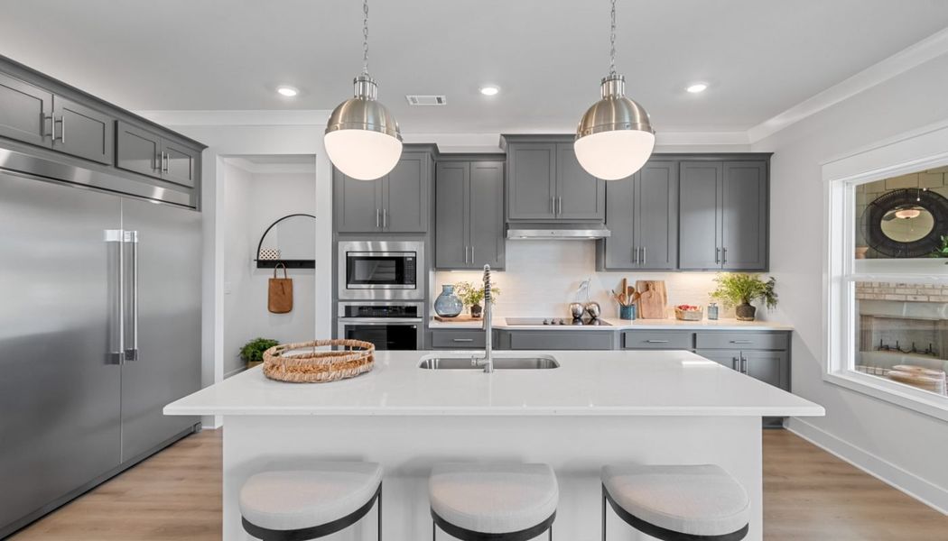 Furnished interior in a model home at Summerlin in Winder (Image 28).