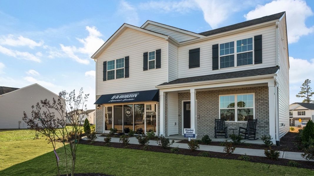Front exterior of a home in the Hoke Loop Ridge community, located in Fayetteville, NC (Image 2). Front exterior of a home in the Hoke Loop Ridge community, located in Fayetteville, NC (Image 2).