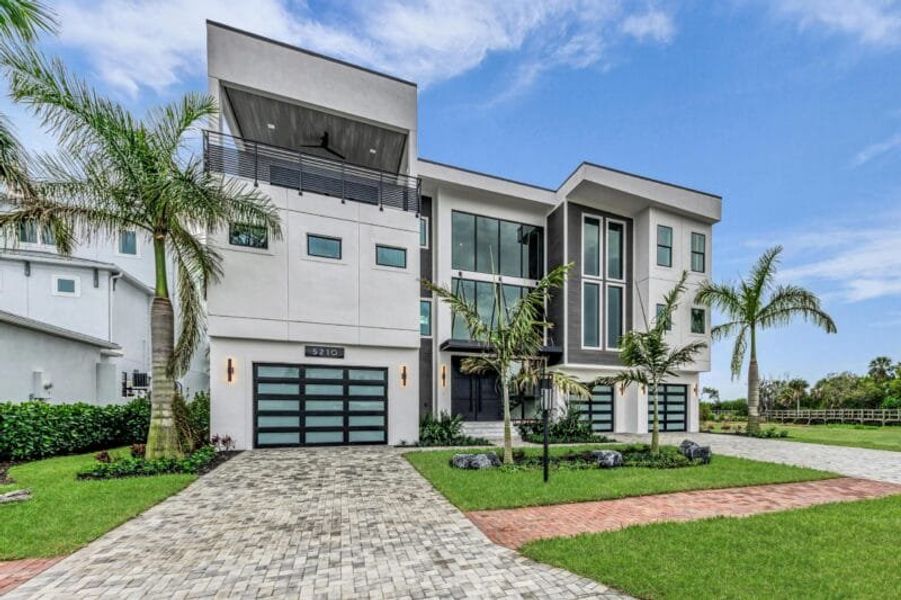 Front exterior of a home in the Legends Bay community, located in Bradenton, FL (Image 4). Front exterior of a home in the Legends Bay community, located in Bradenton, FL (Image 4).