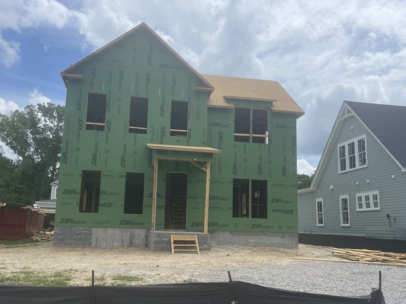 A new home under construction in The Settlement at Ashley Hall by Homes by Dickerson, Charleston, SC. A new home under construction in The Settlement at Ashley Hall by Homes by Dickerson, Charleston, SC.