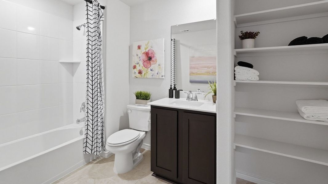 Furnished interior in a model home at The Woods at Lindsey Place in Anna (Image 78).