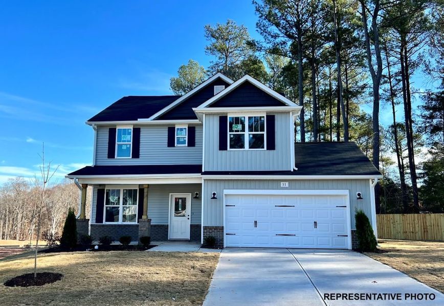 Front exterior of a home in the Marin Woods community, located in Smithfield, NC (Image 2). Front exterior of a home in the Marin Woods community, located in Smithfield, NC (Image 2).