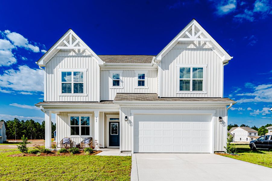 Front exterior of a home in the Terrapin community, located in Leland, NC (Image 11).