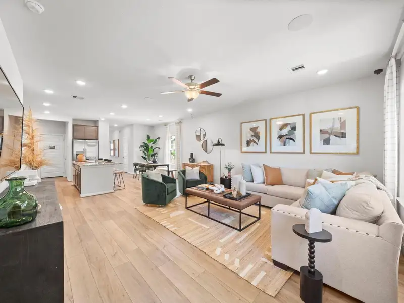 Furnished interior in a model home at Caney Creek Place in Conroe (Image 6).