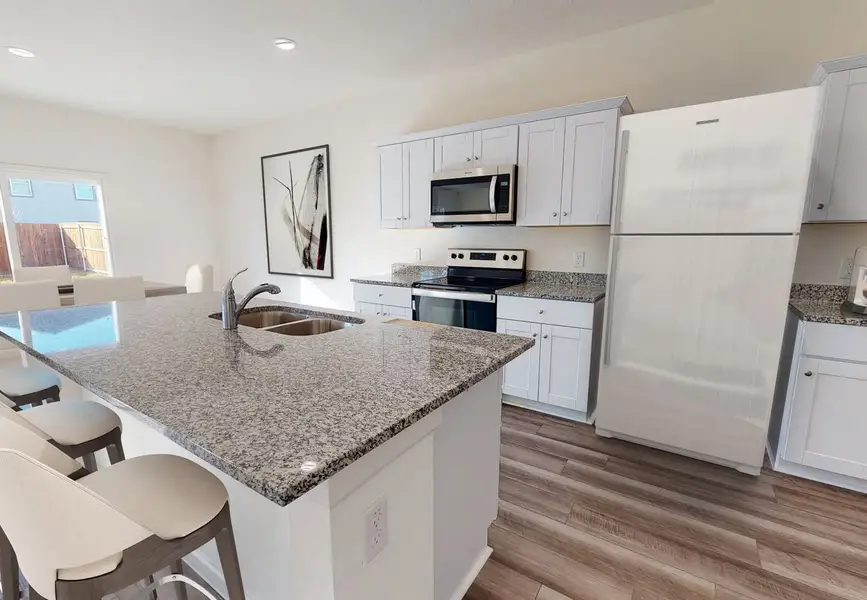 Furnished interior in a model home at Stonebrooke in Conroe (Image 5).