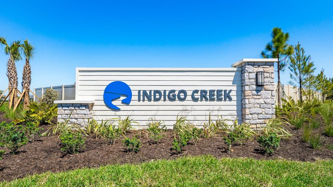 Entrance to the Indigo Creek community in Apollo Beach, FL, featuring signage and landscaping (Image 1). Entrance to the Indigo Creek community in Apollo Beach, FL, featuring signage and landscaping (Image 1).